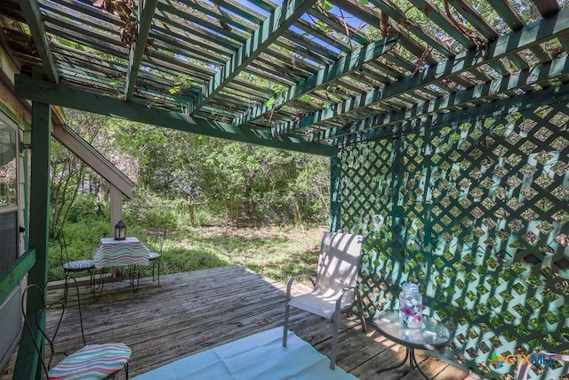 wooden deck with a pergola