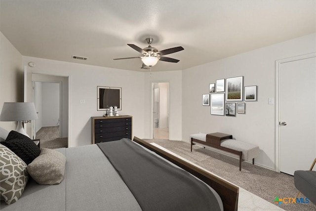 bedroom featuring ceiling fan and carpet flooring