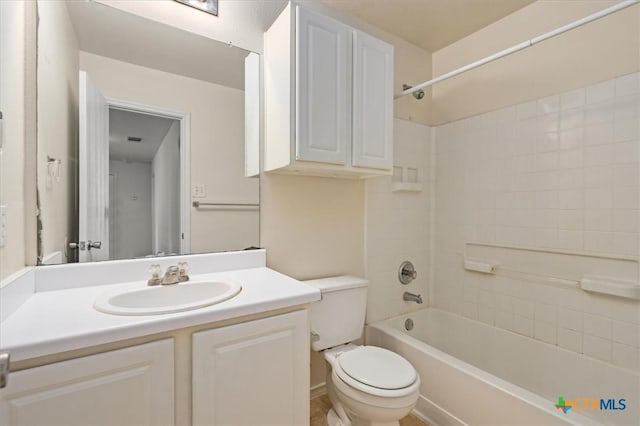 full bathroom with vanity, shower / bathtub combination, and toilet