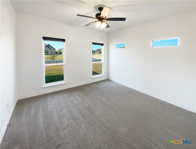 carpeted empty room with ceiling fan