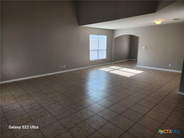 362 Azalea Way, New Braunfels, TX 78132 - unfurnished room featuring arched walkways and baseboards