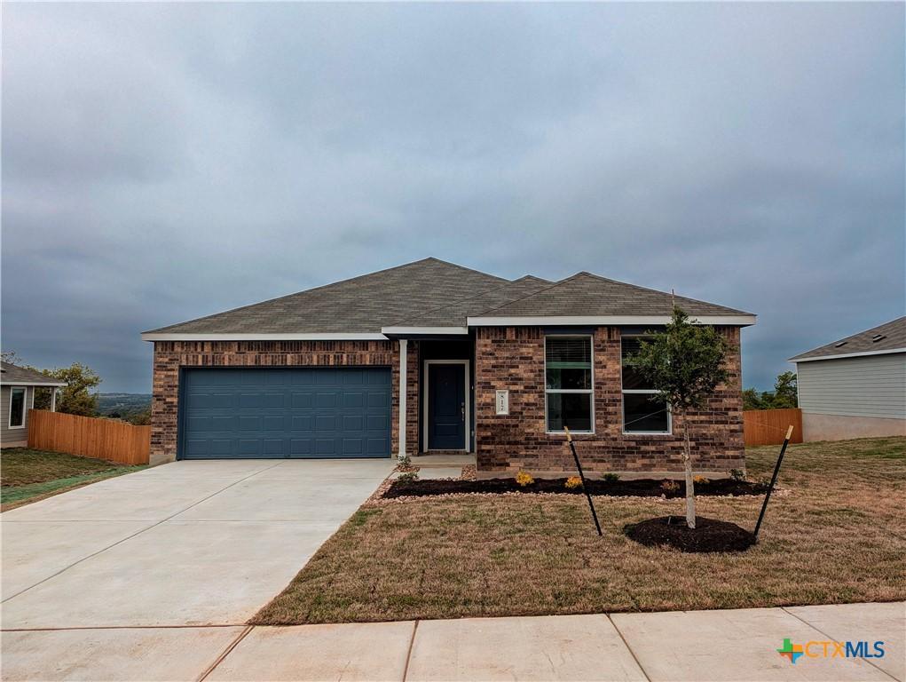817 Bobby Lou Ln, Copperas Cove, TX 76522 - single story home with driveway, a garage, fence, and brick siding