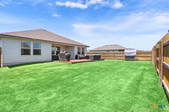 8812 Cantera Ridge Rd, Temple, TX 76502 - rear view of property featuring a deck, a shingled roof, and an outdoor living space