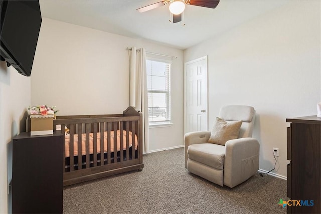 8812 Cantera Ridge Rd, Temple, TX 76502 - carpeted bedroom with a nursery area, baseboards, and ceiling fan