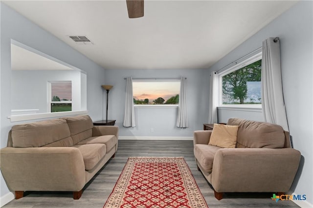 1236 County Road 7611, Devine, TX 78016 - living room with wood finished floors and ceiling fan