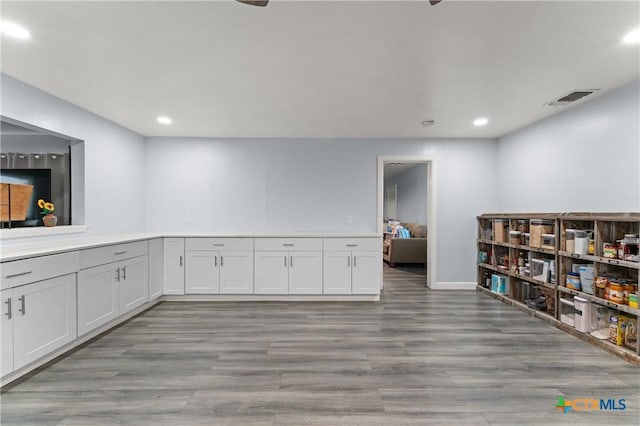 1236 County Road 7611, Devine, TX 78016 - bar with recessed lighting and light wood-type flooring