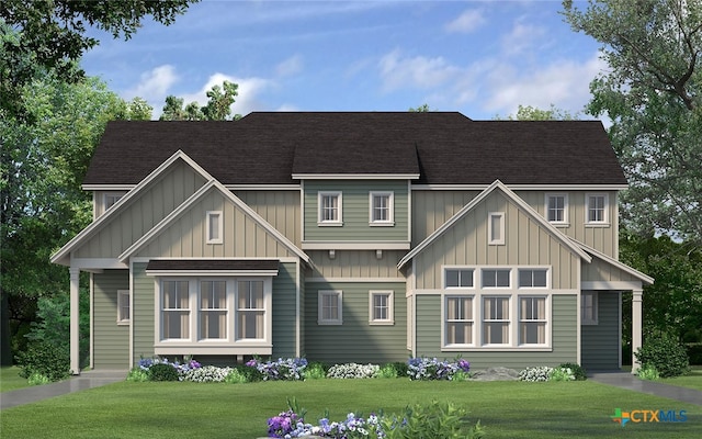 view of front facade featuring roof with shingles, board and batten siding, and a front yard