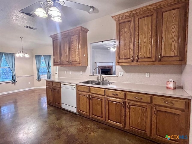 kitchen featuring brown cabinets, light countertops, a sink, ceiling fan, and dishwasher