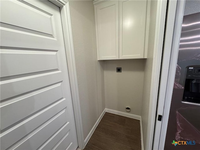 141 Atlas Ave, Killeen, TX 76542 - laundry area with cabinet space, electric dryer hookup, dark wood-type flooring, and baseboards