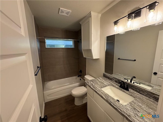 141 Atlas Ave, Killeen, TX 76542 - full bath featuring wood finished floors, toilet, tub / shower combination, and vanity