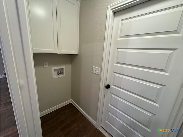 141 Atlas Ave, Killeen, TX 76542 - laundry area with washer hookup, cabinet space, dark wood finished floors, and baseboards