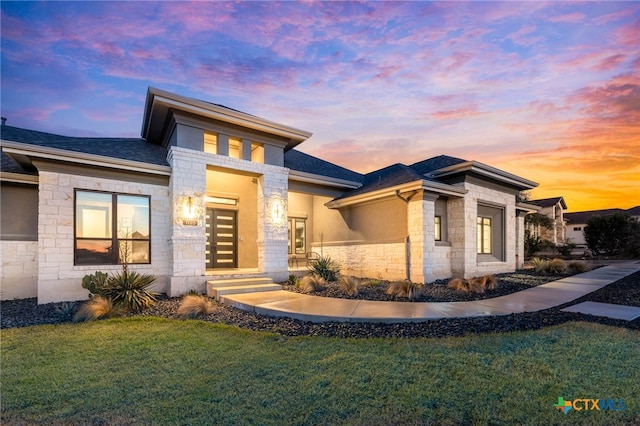 view of front of house with a lawn