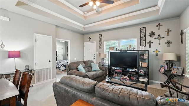 911-913 E Seideman St, Seguin, TX 78155 - living area featuring ornamental molding, ceiling fan, and a raised ceiling