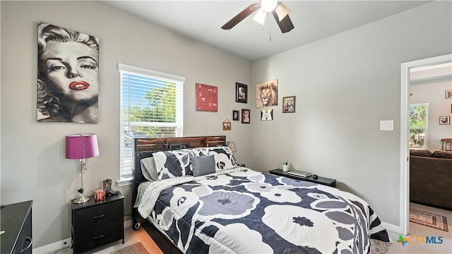911-913 E Seideman St, Seguin, TX 78155 - bedroom with baseboards and a ceiling fan