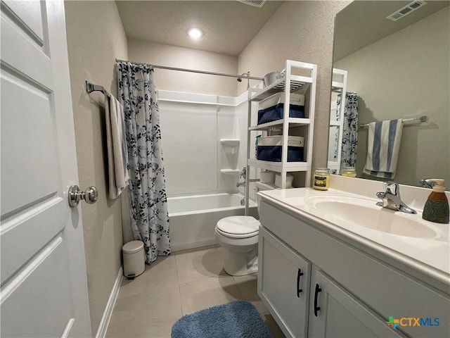 full bathroom with toilet, shower / tub combo with curtain, vanity, and tile patterned flooring