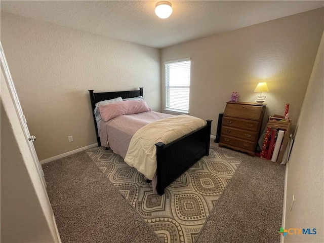 bedroom featuring carpet