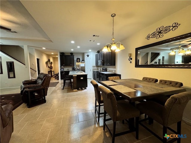 dining area featuring visible vents and recessed lighting