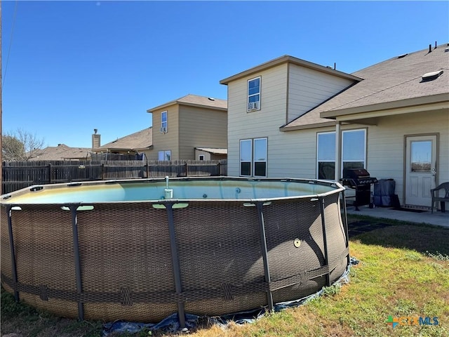 view of pool featuring fence and a fenced in pool