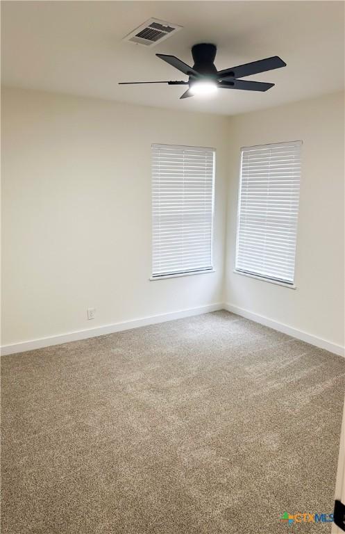 view of carpeted spare room