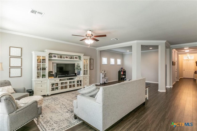 611 Hawks Shadow Dr, Temple, TX 76502 - living area featuring a ceiling fan, ornamental molding, and dark wood-style floors