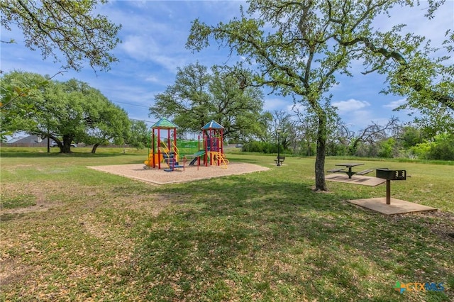 611 Hawks Shadow Dr, Temple, TX 76502 - community playground featuring a lawn