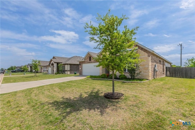 611 Hawks Shadow Dr, Temple, TX 76502 - view of front facade featuring concrete driveway, a garage, stone siding, and brick siding