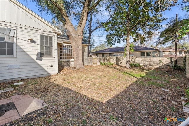 view of yard featuring fence