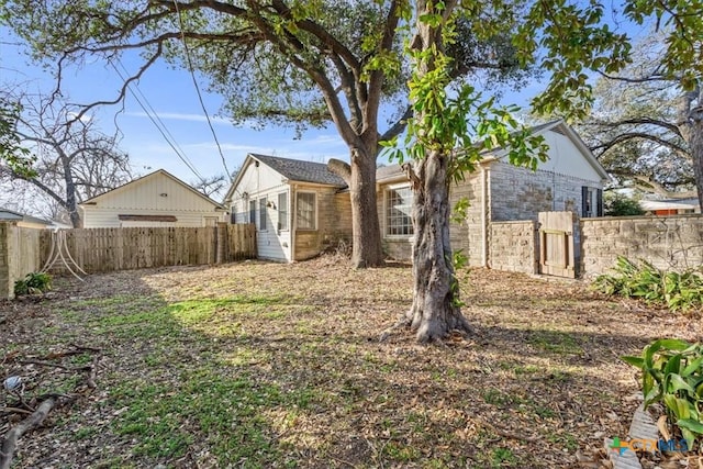 view of yard with fence