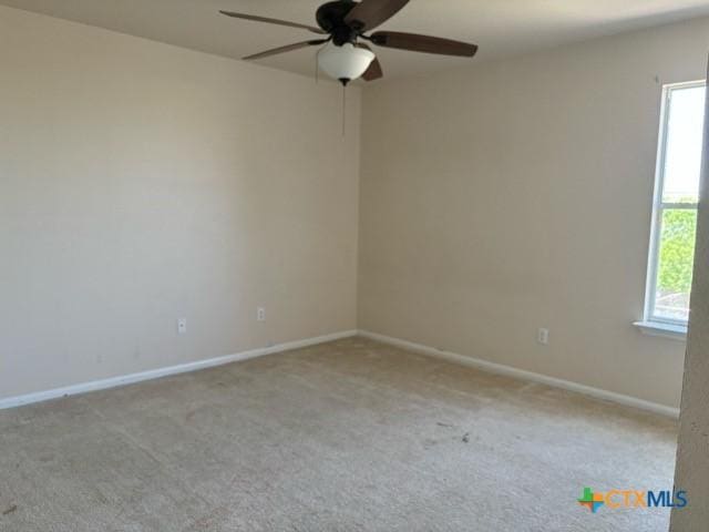 224 Starlight Dr, Temple, TX 76502 - spare room featuring carpet, baseboards, and ceiling fan