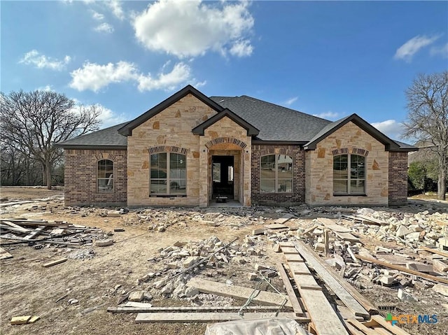 view of french country style house