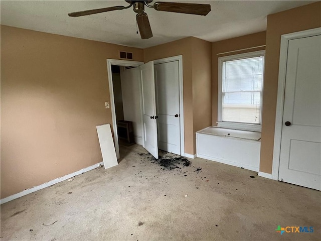 406 Lariat Ln, Victoria, TX 77901 - unfurnished bedroom with baseboards, a ceiling fan, visible vents, and carpet
