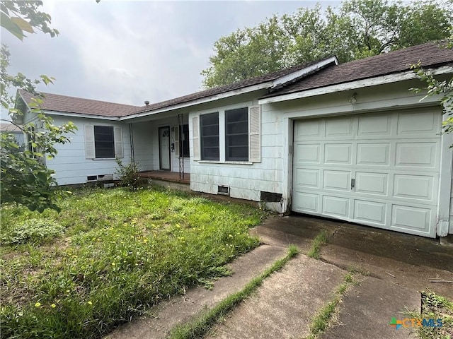 406 Lariat Ln, Victoria, TX 77901 - single story home with driveway, roof with shingles, and an attached garage