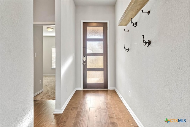 doorway featuring hardwood / wood-style flooring