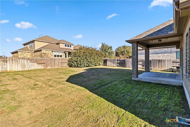 view of yard with a patio area