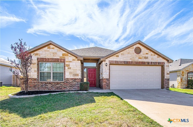 view of front facade featuring a garage and a front yard