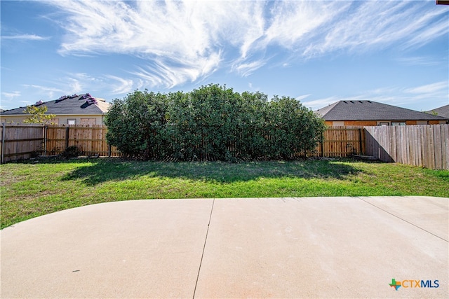 view of yard with a patio area