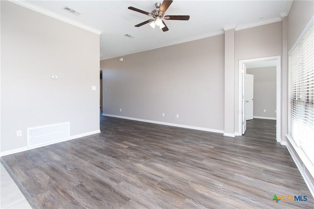 unfurnished room with ornamental molding, dark hardwood / wood-style flooring, and a healthy amount of sunlight