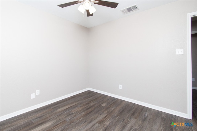 unfurnished room featuring dark hardwood / wood-style floors and ceiling fan