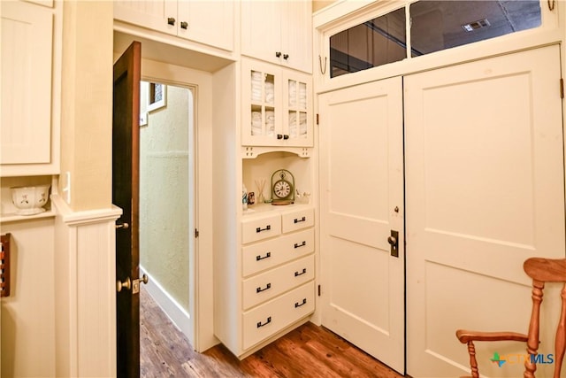 122 E Main St, Cuero, TX 77954 - detailed view of wood finished floors and baseboards