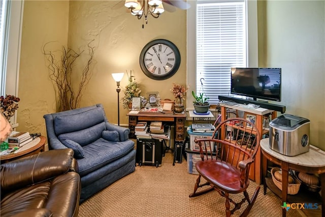 122 E Main St, Cuero, TX 77954 - living area featuring carpet flooring, a ceiling fan, and an office area