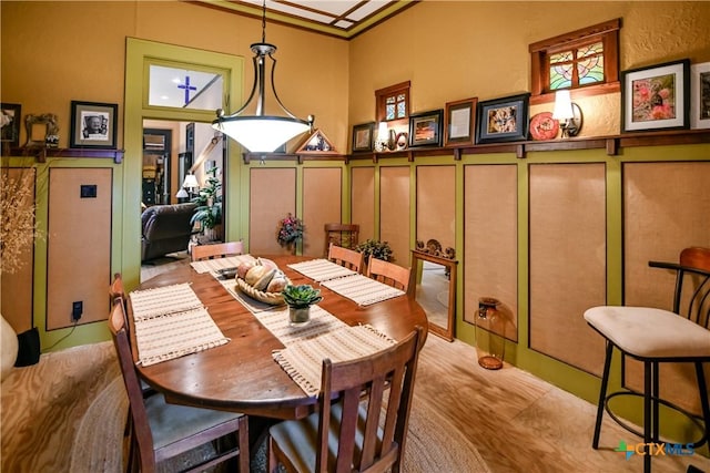 122 E Main St, Cuero, TX 77954 - dining room with a decorative wall and wainscoting