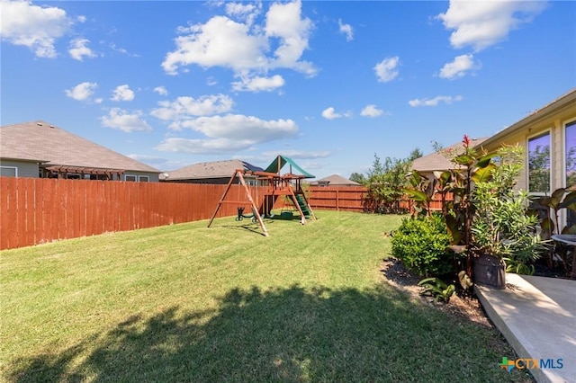 view of yard featuring a playground