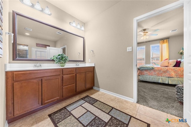 bathroom featuring vanity, tile patterned floors, and ceiling fan