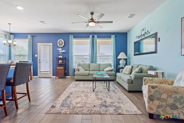 2306 Verona Ct, Harker Heights, TX 76548 - dining space featuring a chandelier, wood finished floors, and baseboards