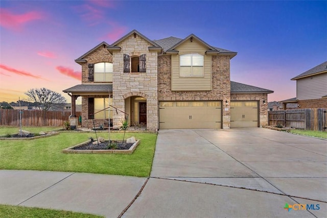 2306 Verona Ct, Harker Heights, TX 76548 - view of front of house featuring stone siding, driveway, and a garage