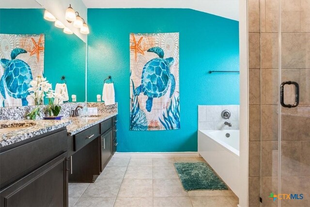 2306 Verona Ct, Harker Heights, TX 76548 - full bath featuring a shower stall, a garden tub, and a textured wall