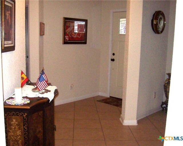 view of tiled entrance foyer