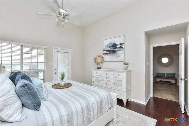 3404 American Dr Unit 3315, Lago Vista, TX 78645 - bedroom with dark wood-style floors, baseboards, and ceiling fan
