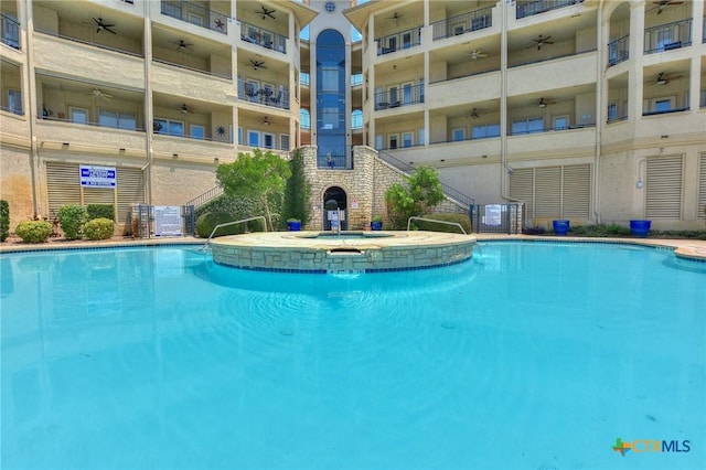 3404 American Dr Unit 3315, Lago Vista, TX 78645 - view of swimming pool with a hot tub and ceiling fan