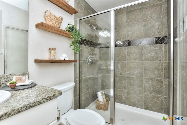 3404 American Dr Unit 3315, Lago Vista, TX 78645 - full bathroom with toilet, a stall shower, and vanity
